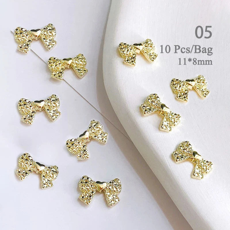 Aichashi 10pcs/bag Butterfly Shaped Nail Rhinestone Star Flower Nail Charm Silver Gold Alloy Nail Pearl Jewelry Accessories Nail Supplies