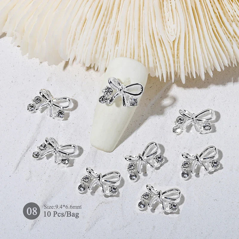 Aichashi 10pcs/bag Butterfly Shaped Nail Rhinestone Star Flower Nail Charm Silver Gold Alloy Nail Pearl Jewelry Accessories Nail Supplies