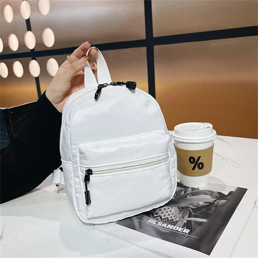 Aichashi Korean Nylon holographic backpack Women Casual Solid Color Small Schoolbag Travel Bag For Teenager Student School Bag Back